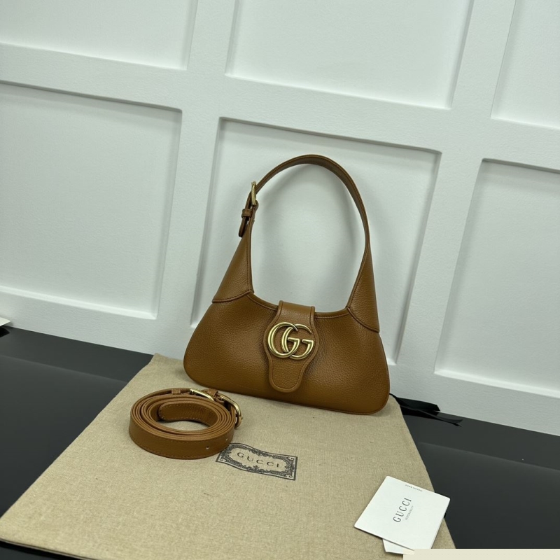 G*u*i top handle bags